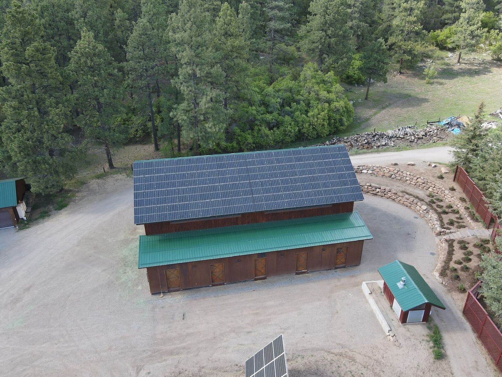 Aerial view of completed site work around a barn property near Durango